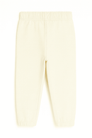 Cream Flower Placement Print Track Pants Cream Nawao.com