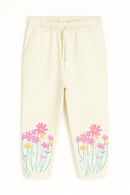 Cream Flower Placement Print Track Pants Cream Nawao.com