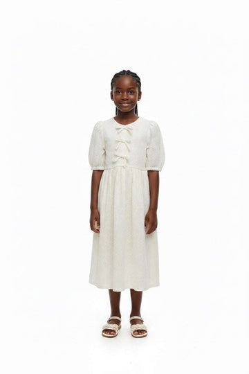 Cream Laser Cut Dress With Front Bow Cream Nawao.com